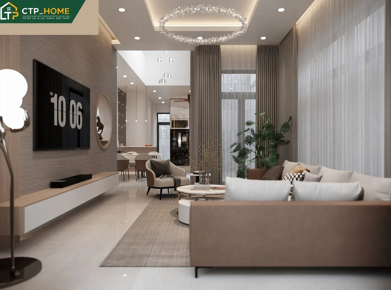Phòng khách biệt thự Đồng Nai 3 tầng với sofa da cao cấp và hệ tủ âm tường hiện đại