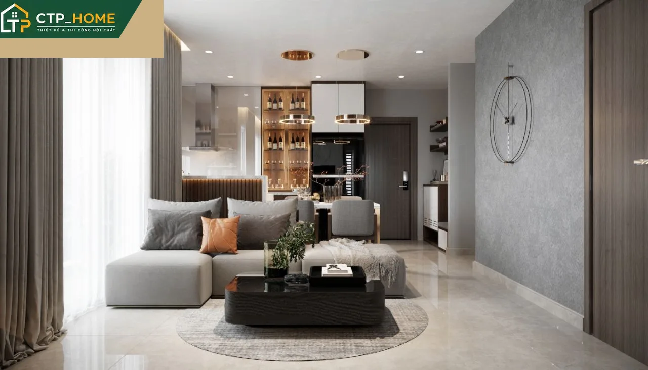 Thiết kế nội thất phòng khách chung cư Emerald Bình Dương 75m2 với sofa góc và kệ tivi gỗ óc chó