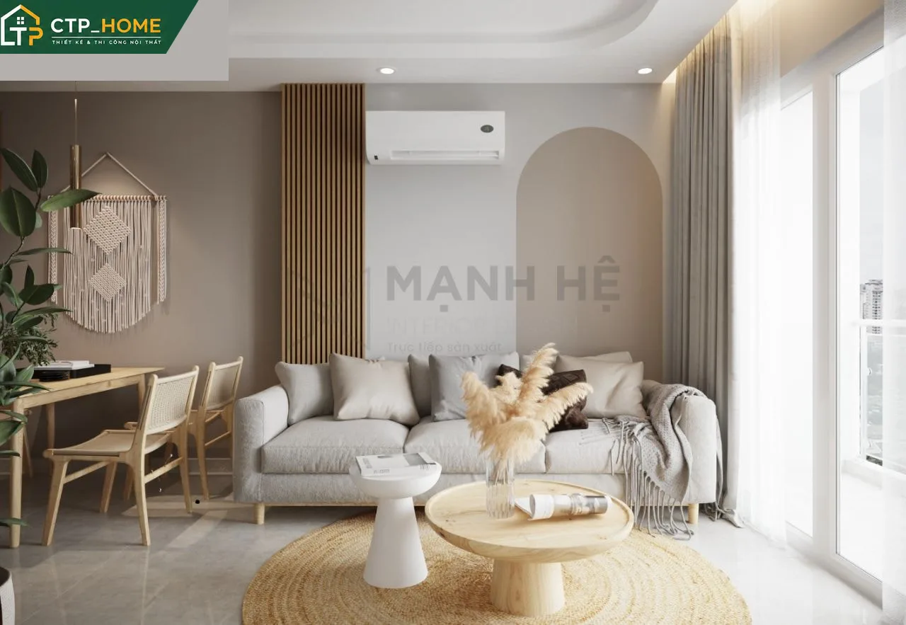 Góc phòng khách chung cư Emerald Bình Dương 54m2 với sofa chữ L, kệ tivi gỗ óc chó và ánh sáng gián tiếp