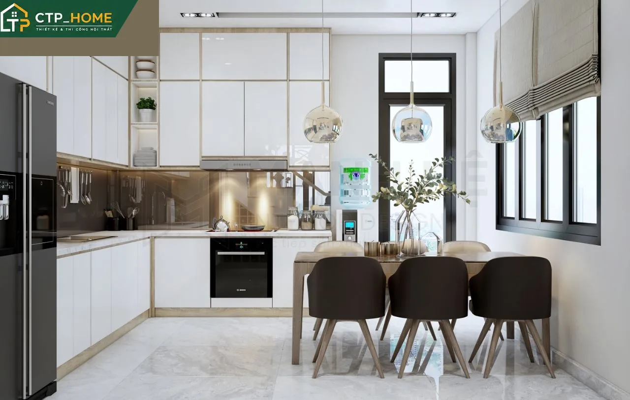 Bếp hiện đại nhà phố Thủ Đức với đảo bếp đá nhân tạo và hệ tủ cao cấp phủ Acrylic bóng gương
