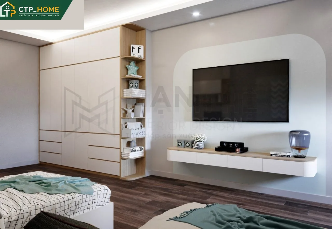 Góc thư giãn tầng 3 nhà phố Bình Dương với ghế bành da và kệ sách gỗ tự nhiên