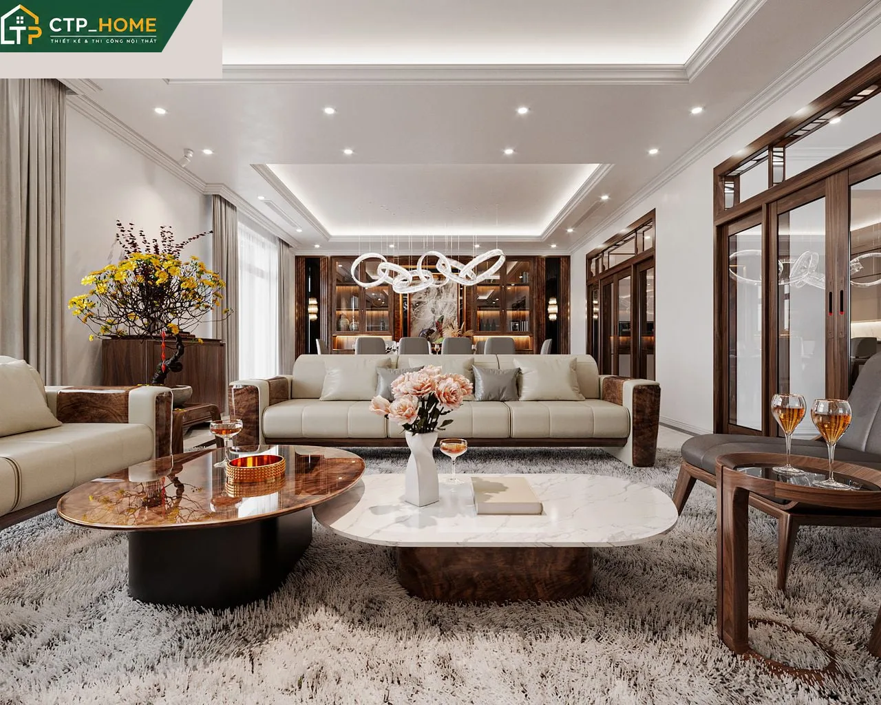 Phòng khách biệt thự Đồng Nai 3 tầng với sofa da cao cấp và kệ tivi gỗ óc chó tự nhiên