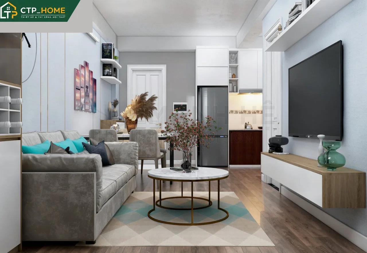 Thiết kế nội thất căn hộ mini Phan Thành 33m2 với phòng khách mở kết nối bếp và bàn ăn nhỏ gọn
