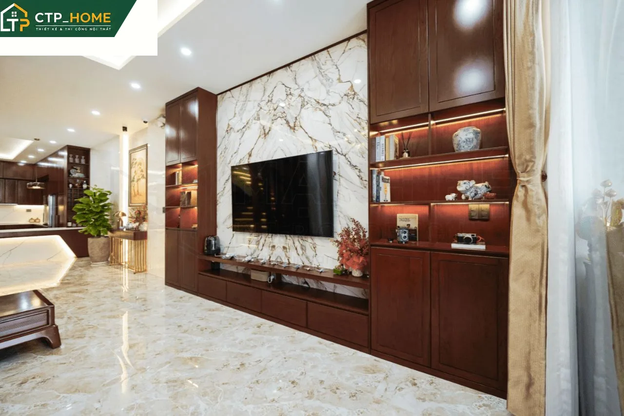 Phòng ngủ master nhà phố 3 tầng với tủ gỗ và giường lớn