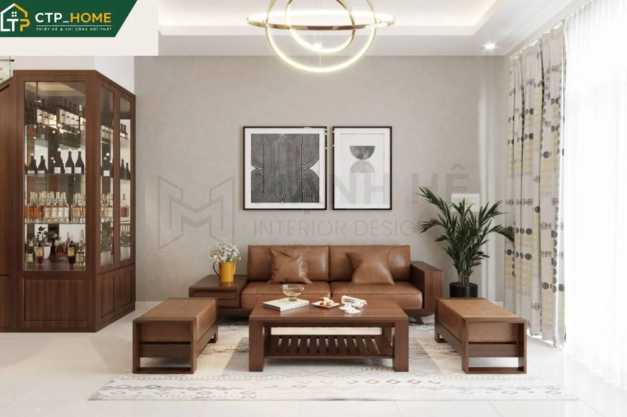 Không gian phòng khách nhà phố anh Hoàng Long An với sofa da cao cấp và kệ tivi gỗ óc chó
