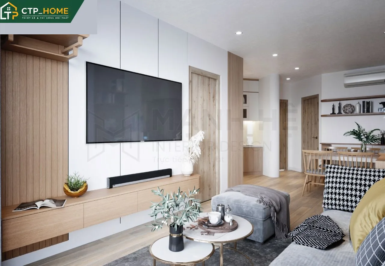 Phối cảnh phòng khách chung cư Trinity Tower 54m2 với sofa chữ L, kệ tivi gỗ óc chó và đèn trần hiện đại